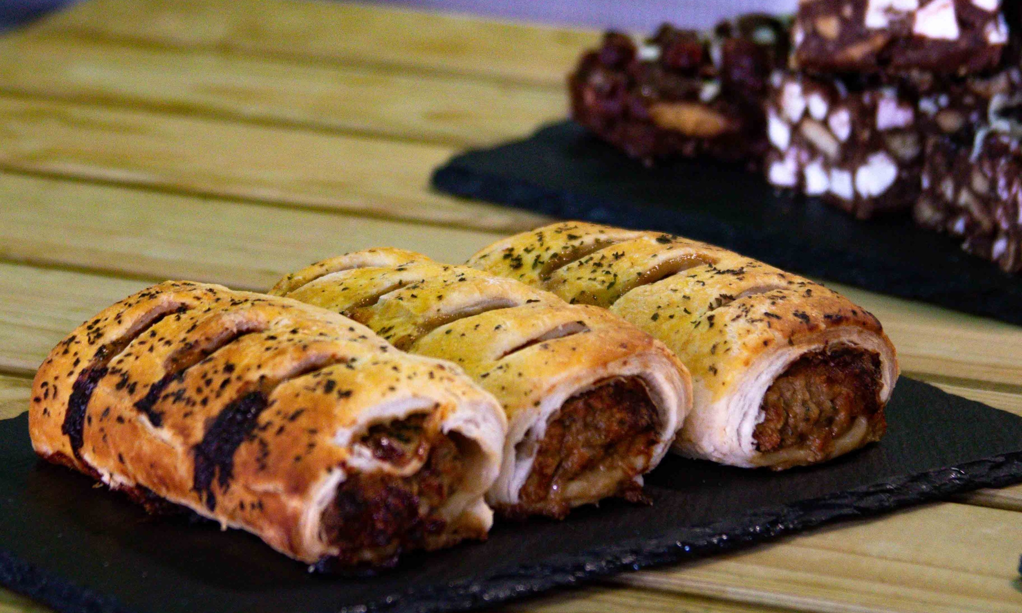 Vegan and traditional sausage rolls on display at the Play Barn Café at Wroxham Barns.